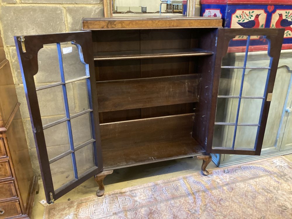 A 1920s Queen Anne revival bookcase, width 78cm, depth 26cm, height 108cm